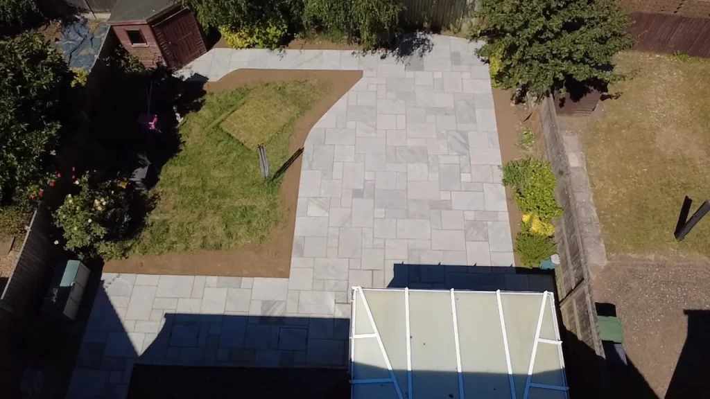 Aerial view of the finished sandstone patio, path and lawn