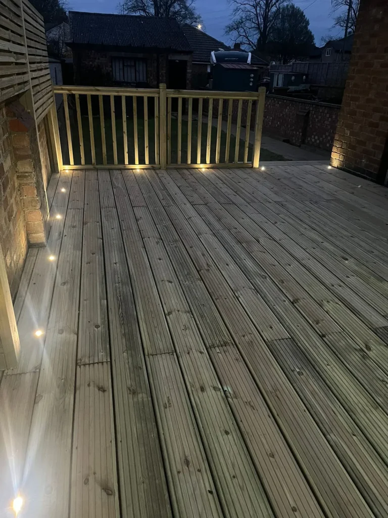Deck spotlights along the balustrade and boundary wall