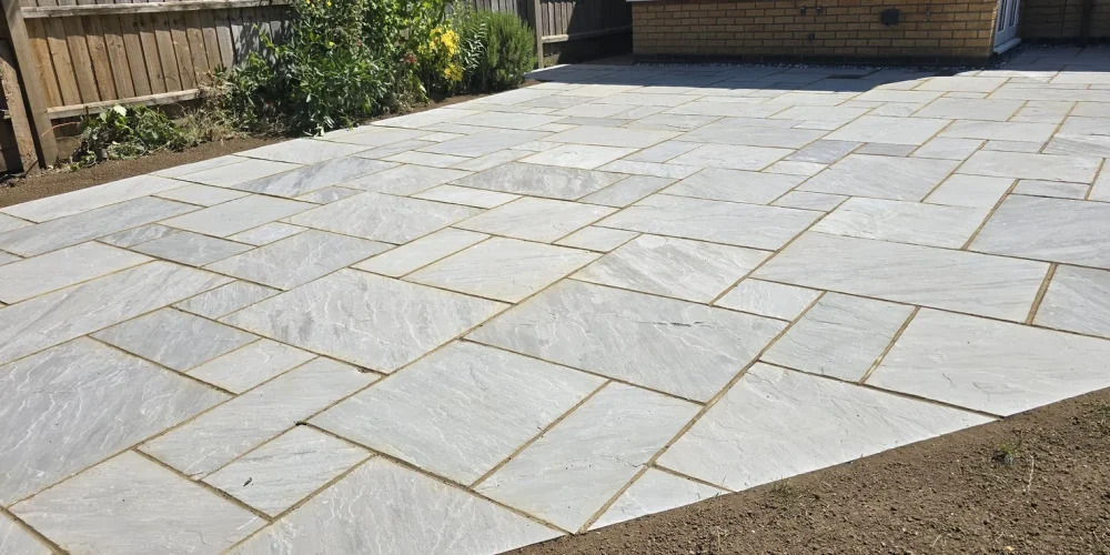 Kandla Grey Indian sandstone patio in a Thrapston garden